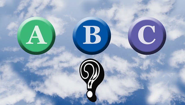 letters a, b and c and a question mark on a sky background